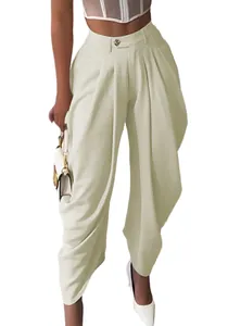 Detail view of elegant high-waisted pleated balloon trousers in cream beige color
