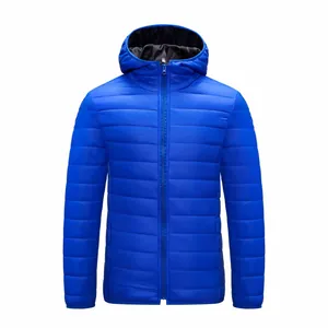 Front view of a men's lightweight blue hooded puffer jacket with quilted texture.