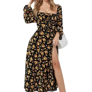 Detailed view of a French style floral print maxi dress with long sleeves and a high slit