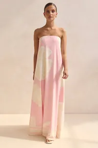 Detail view showing the elegant pink strapless floral maxi dress with large prints for summer