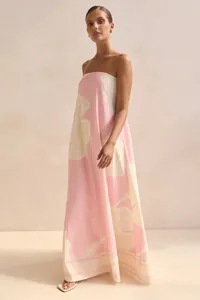 Elegant strapless maxi dress featuring a chic pink and cream floral print for summer