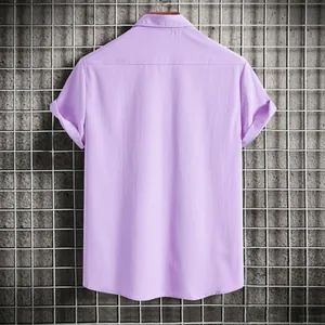 Macro view showing the back detail of a light purple short-sleeved button-up shirt for men