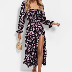 Close-up detail of a French floral print long sleeve dress with high slit and bodice design