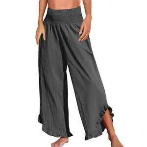 Detailansicht der dunkelgrauen Baumwoll-Leinen-Hose mit hohem Bund und Volants am Saum
