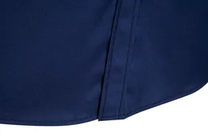 Close-up detail of navy blue shirt hem with high-quality stitching and fabric texture