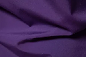 Macro texture view of solid purple high-quality fabric for men's casual long sleeve shirt