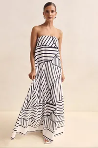 Detail shot of a strapless summer maxi dress featuring a bold black and white geometric print