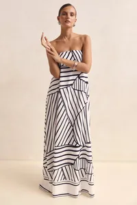 Elegant women's strapless maxi dress with a striking black and white geometric print