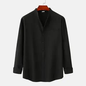 Detailed view of a black men's linen casual shirt featuring a stand collar and chest pocket