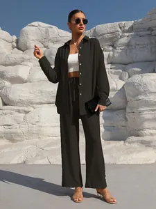 Elegant women's casual two-piece set with a long-sleeve shirt and matching wide-leg pants