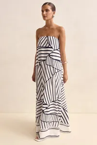 Elegant strapless long dress featuring a bold black and white geometric print design.
