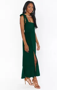 Elegant dark green French style maxi dress with high side slit and tie-shoulder straps.