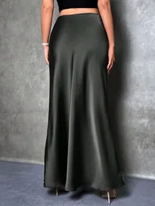 Elegant dark green satin maxi skirt back view showing the smooth silk-like texture