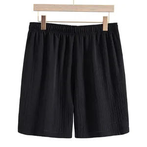 Summer men's casual black shorts with textured jacquard fabric and elastic waist