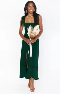 Elegant dark green slit maxi dress featuring adjustable bow tie straps and square neck