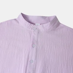 Close-up of light purple men's cotton linen shirt with band collar