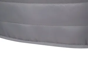 Close-up of grey quilted fabric and stitching on men's winter jacket