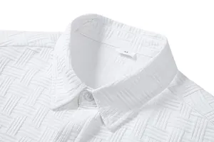 Macro view of white men's summer shirt collar showing detailed basketweave fabric texture