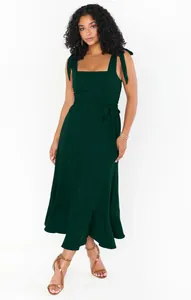 Elegant dark green midi dress featuring shoulder ties and a flattering square neckline.