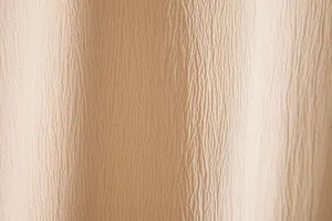 Close-up detail of beige textured fabric for summer men's short sleeve casual shirt