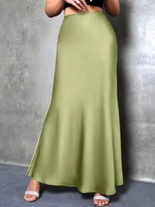 Detail view of the olive green satin midi skirt showcasing the silky fabric sheen.