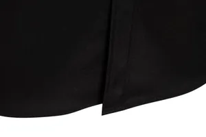 Close-up detail of the hemline and high-quality stitching on a black men's casual shirt
