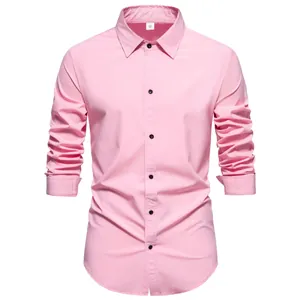Front view of men's pink long sleeve casual dress shirt with black buttons