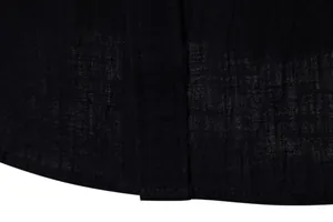 Macro view of black cotton linen fabric texture and hem stitching on a men's shirt