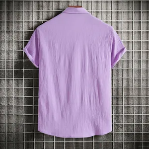 Back view of a lavender textured short-sleeved button-down shirt for men with a relaxed fit.