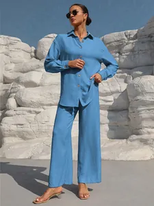 Full view of a blue long-sleeve casual shirt and wide-leg trousers two-piece set.