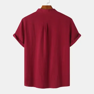 Detailed back view of a burgundy cotton linen men's shirt with a stand collar and pleated yoke