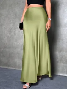 Detailed view of elegant green satin silk-like maxi skirt showing soft texture