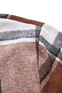 Detalle macro de la tela de camisa a cuadros marrón para hombre con trama de espiga
