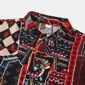 Detailed macro view showing the collar and vibrant ethnic print of a men's Hawaiian shirt