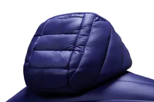Macro view of blue lightweight hooded winter jacket's quilted texture and stitching