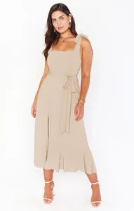 Elegant beige square neck midi dress with tie straps and a front slit for stylish women