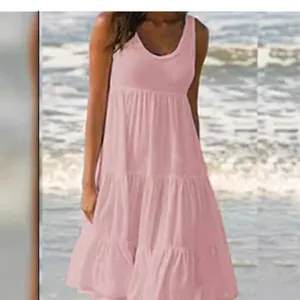 Elegantes ärmelloses Strandkleid in Rosa mit Rundhalsausschnitt und Stufenrock für Damen