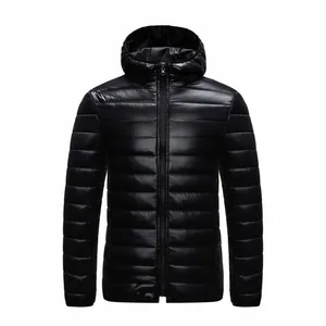 Detail view of men's lightweight hooded puffer jacket in shiny black quilted fabric