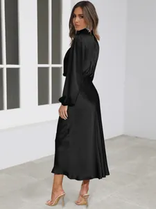 Full view of elegant black satin long-sleeved midi dress featuring a high neckline