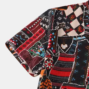 Close-up of vibrant patchwork Hawaiian print fabric on a men's short sleeve casual shirt