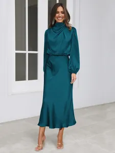 Elegant teal satin long-sleeve dress with high neck for a sophisticated evening look