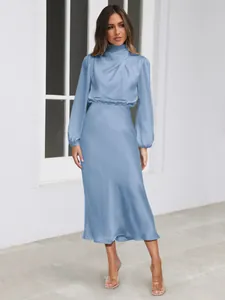 Elegant blue satin long-sleeved evening dress with a high-neck and elastic waist detail