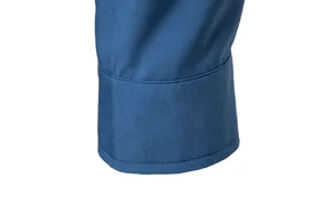 Macro view of blue men's casual shirt cuff showing fabric texture and neat stitching