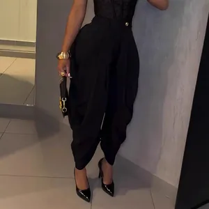 Chic solid black high-waisted bud pants with pleated detail for urban women's fashion
