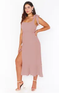 Elegant mauve pink midi dress featuring a stylish side slit and tie-shoulder straps.