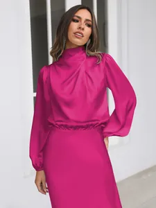 Elegant magenta satin long sleeve maxi dress showing a sophisticated high neck design.