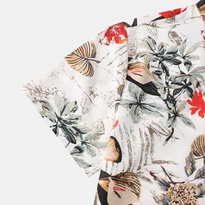 Detailed close-up of Hawaiian tropical leaf print on short-sleeved shirt fabric
