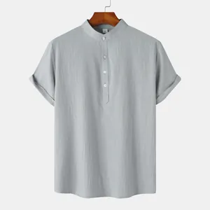 Close-up of grey short-sleeved cotton linen shirt with stand collar and buttons