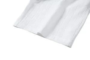 Macro detail of high-quality white woven fabric with intricate basketweave pattern
