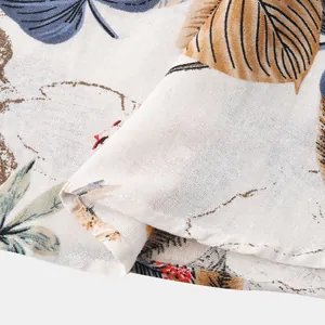 Detailed macro shot of breathable linen-like fabric texture on men's Hawaiian shirt